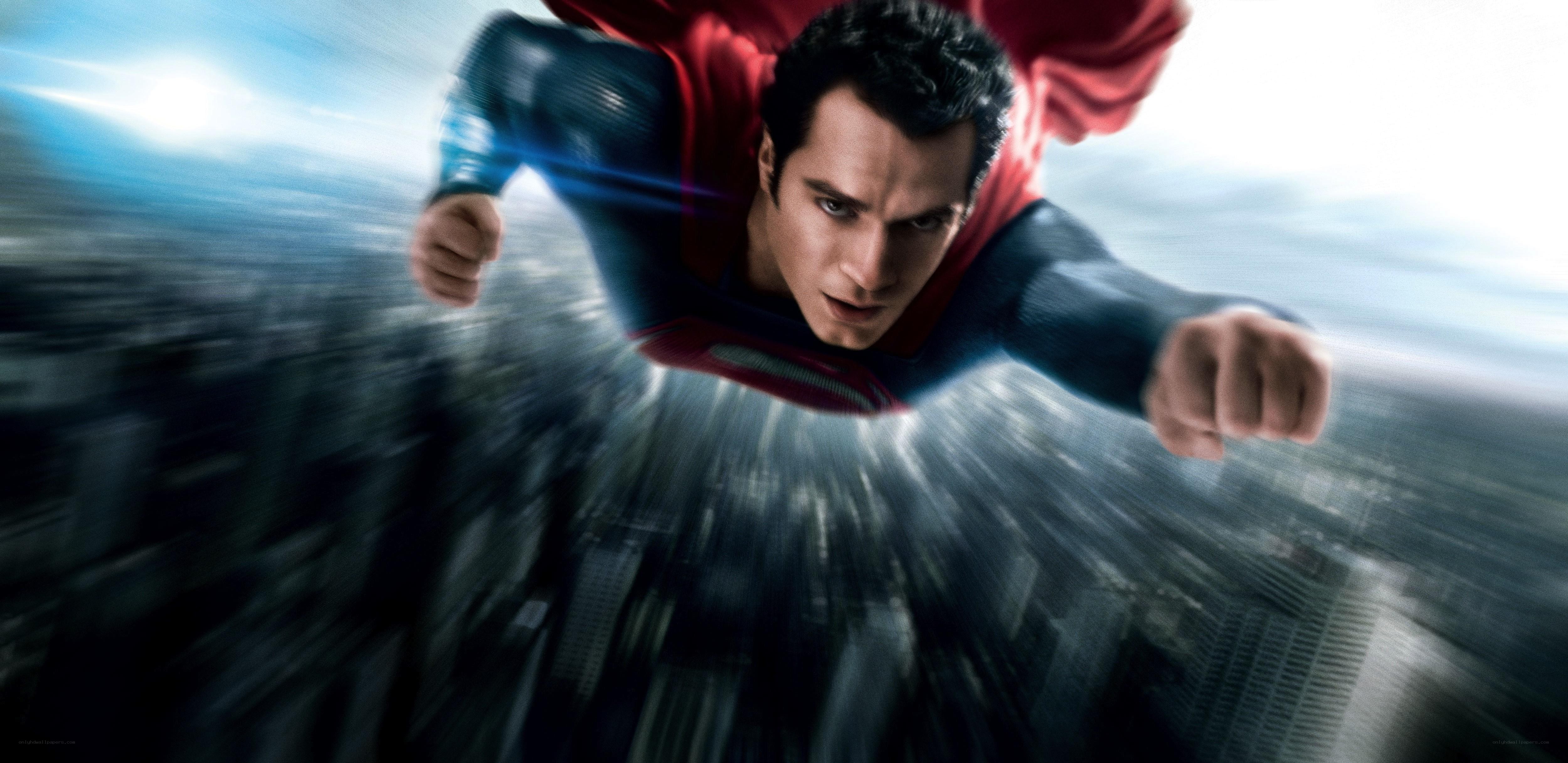 Superman flying over city