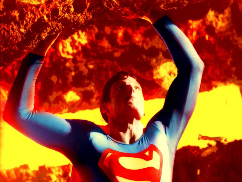 Superman Lifting Rock