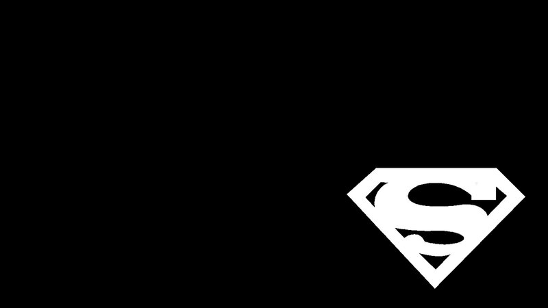 Superman logo on black