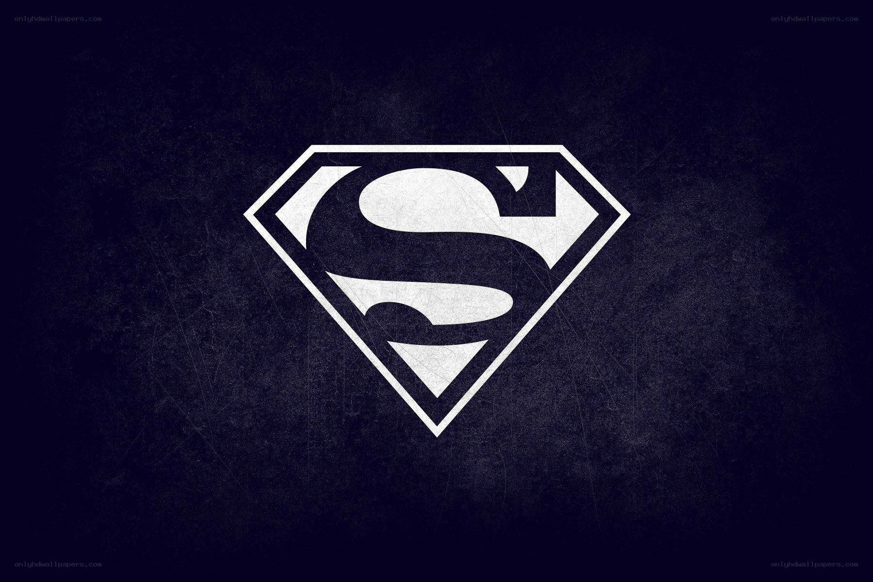 Superman logo on dark background