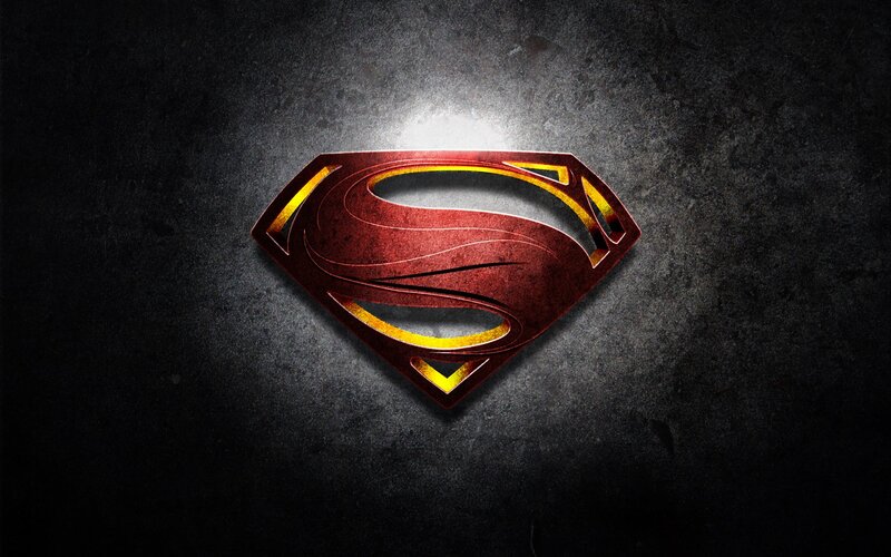 Superman logo on dark background