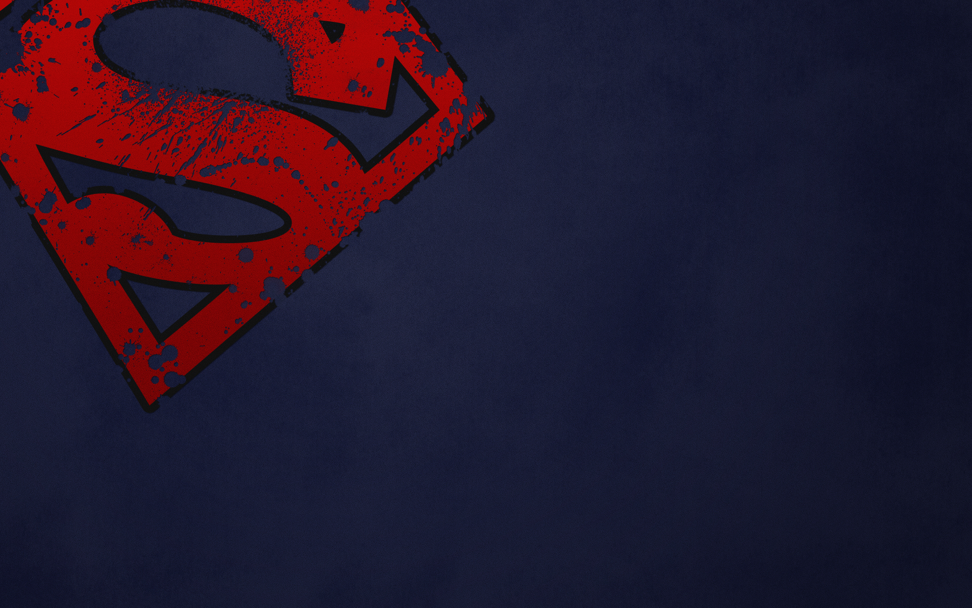 Superman logo on dark background