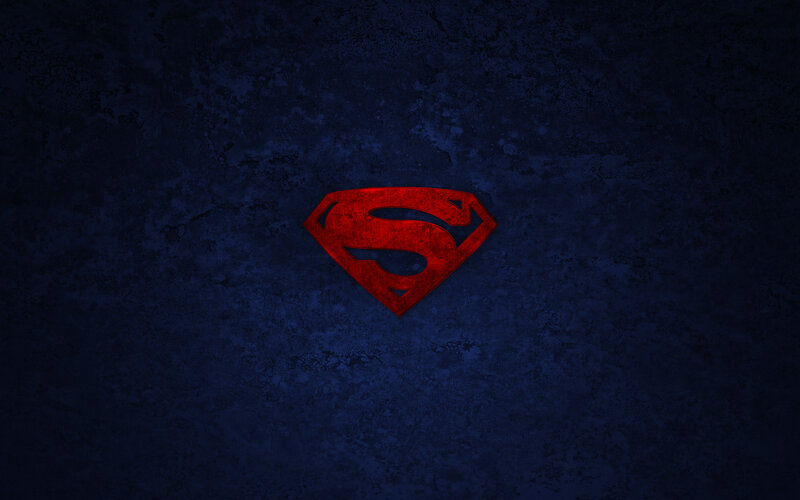 Superman logo on dark background
