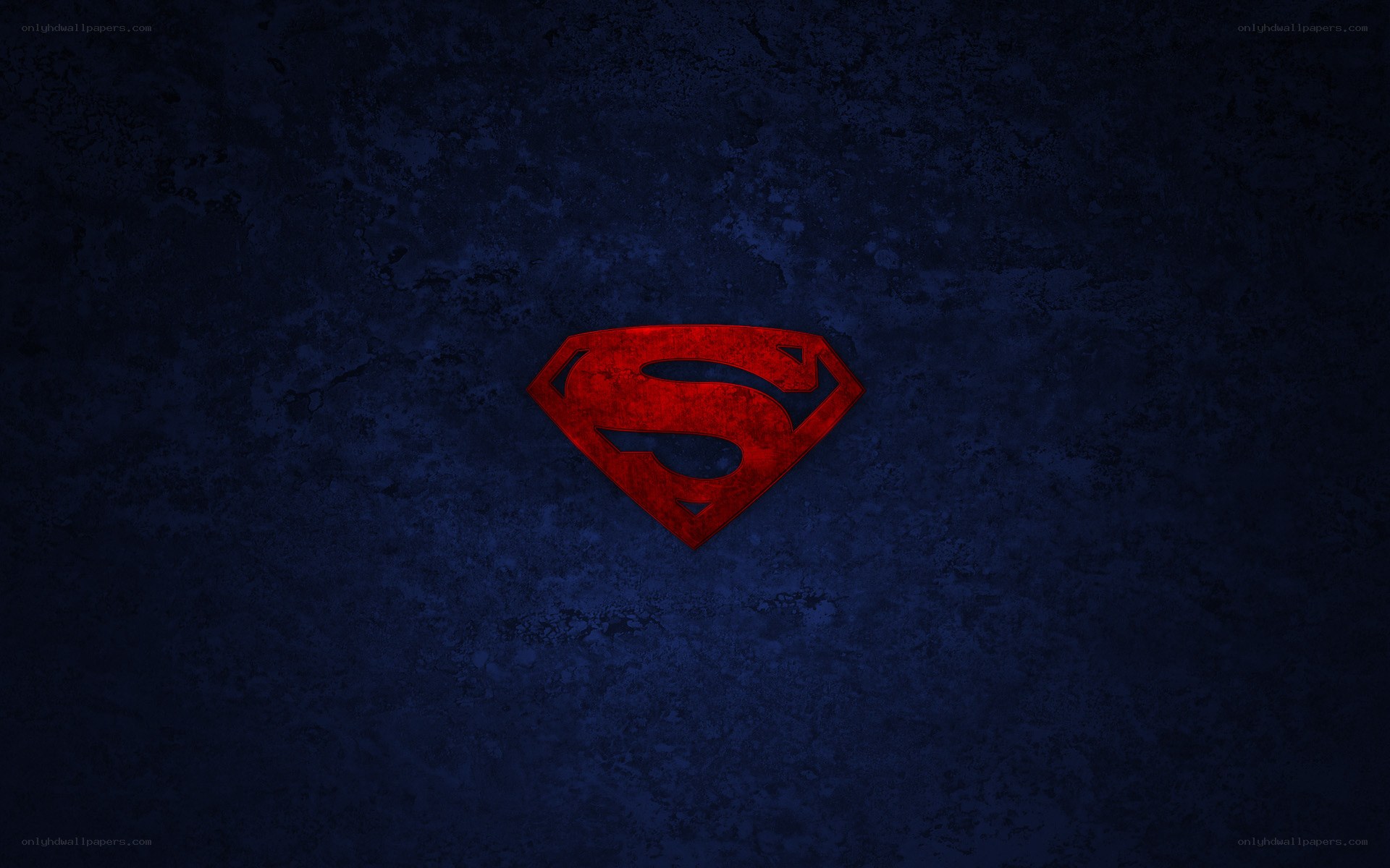 Superman logo on dark background