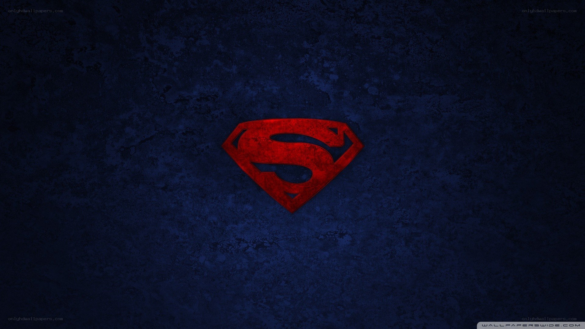 Superman logo on dark background