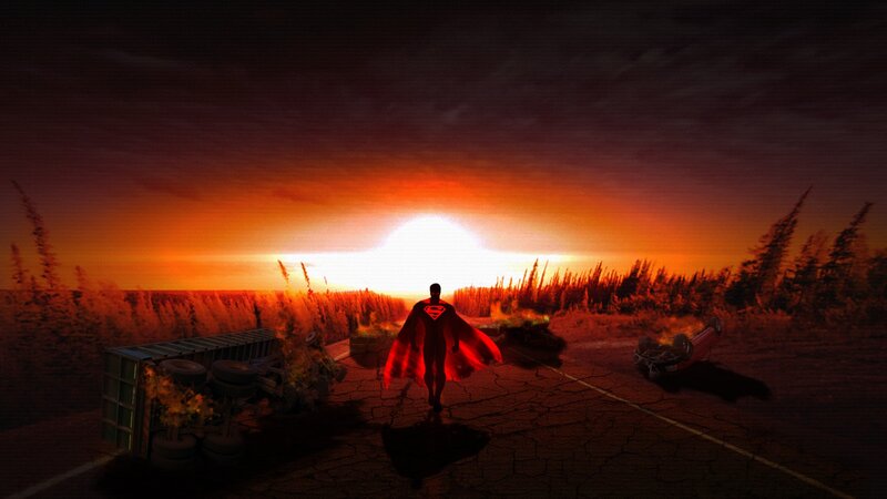 Superman stands at sunset