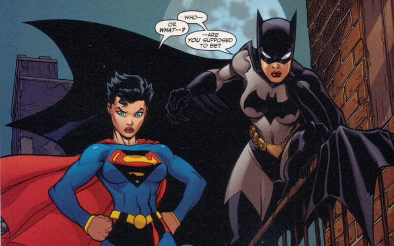 Superwoman and Batgirl in alley