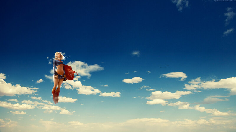 Superwoman flying in the sky