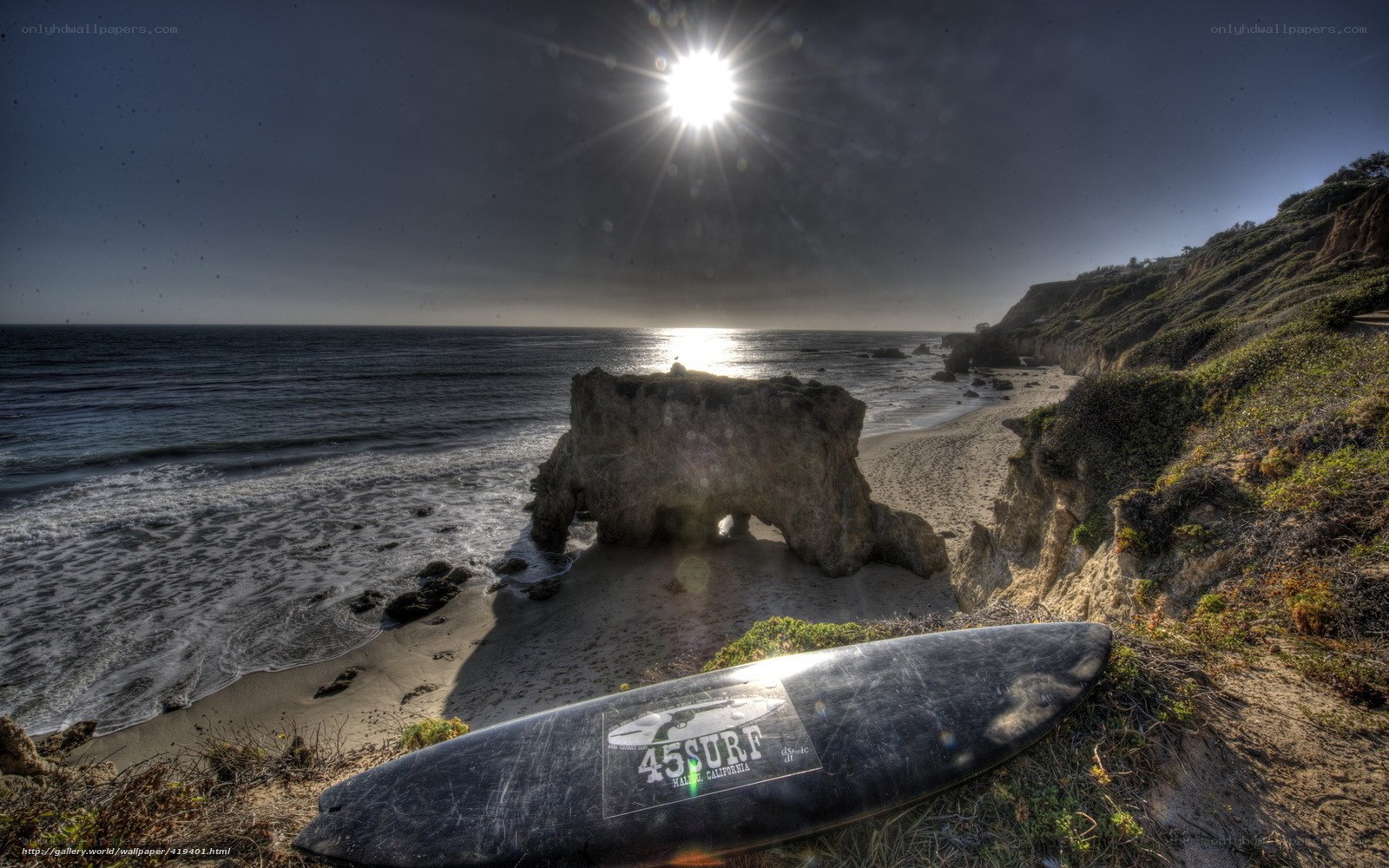 Surfboard on a coastal cliff