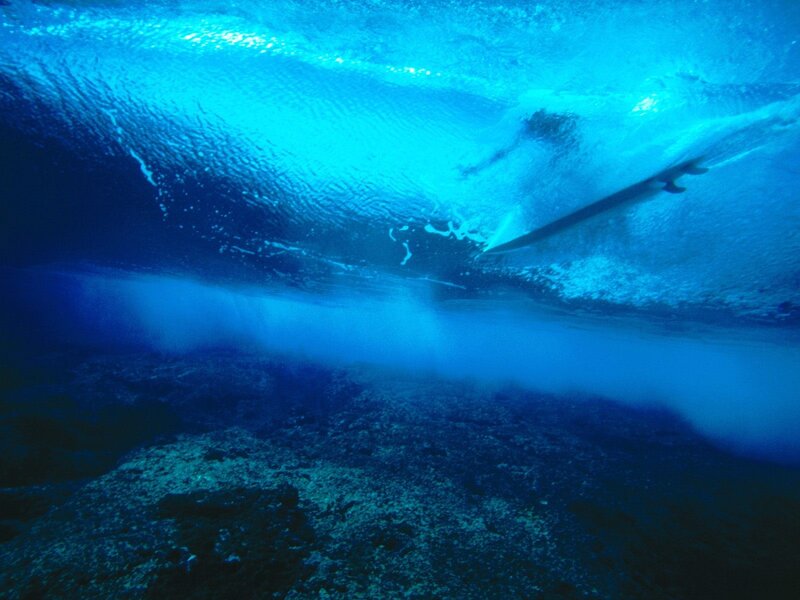 Surfboard under Wave