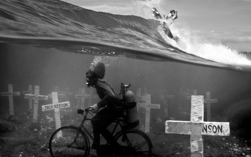 Surfer and diver in a surreal scene