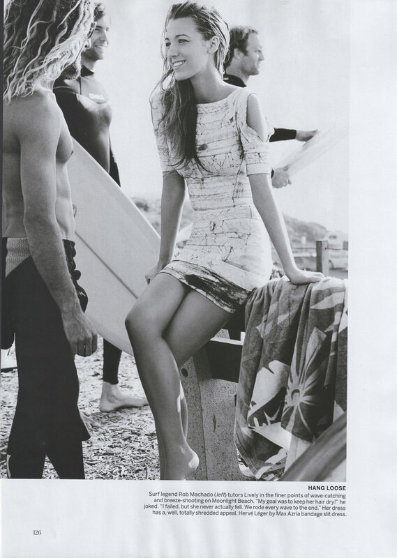 Surfer and model at the beach