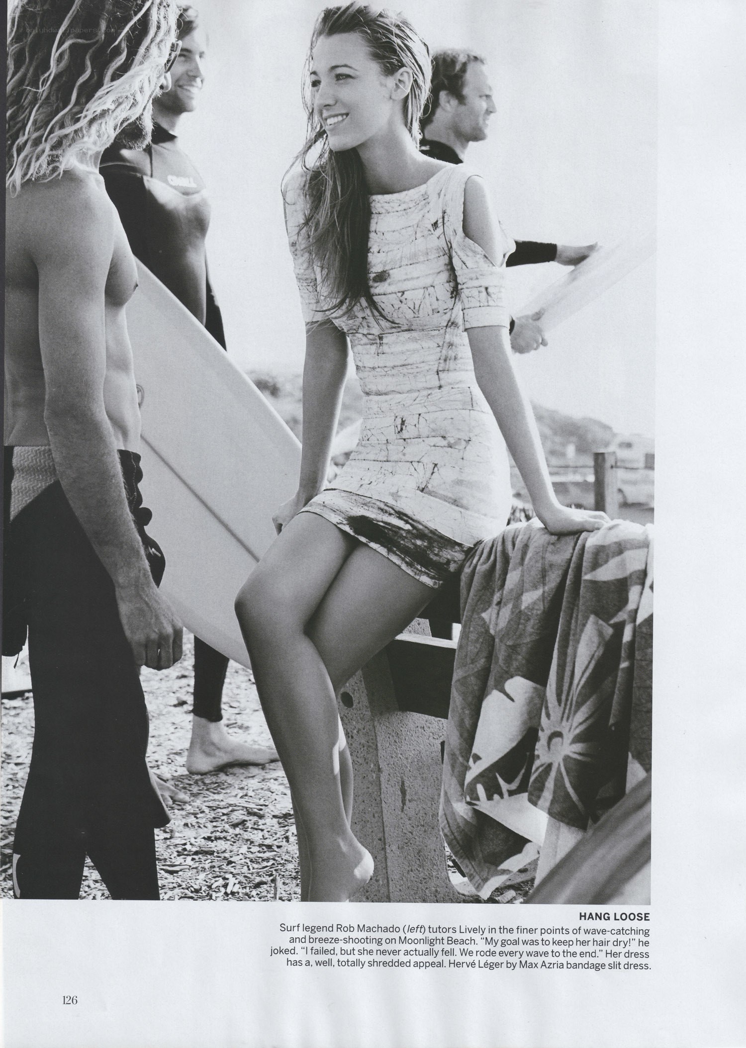 Surfer and model at the beach
