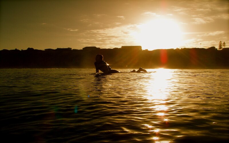 Surfer at sunset