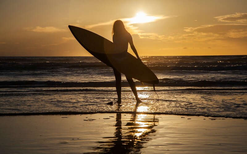 Surfer at Sunset — Gold