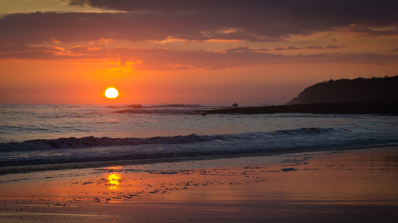 Surfer at Sunset — Orange, Serene, Photograph, Ocean, Cliff