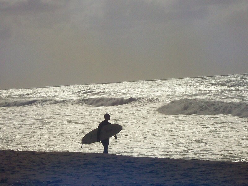 Surfer at the shoreline