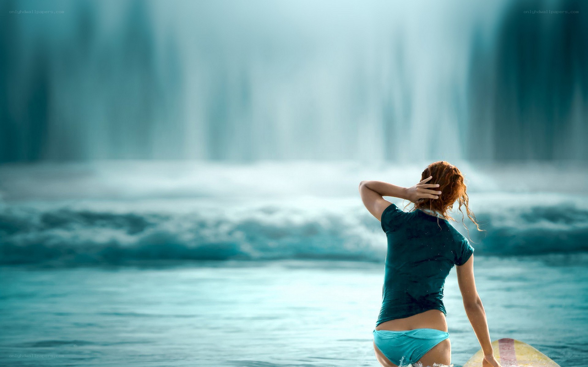 Surfer at the waterfall