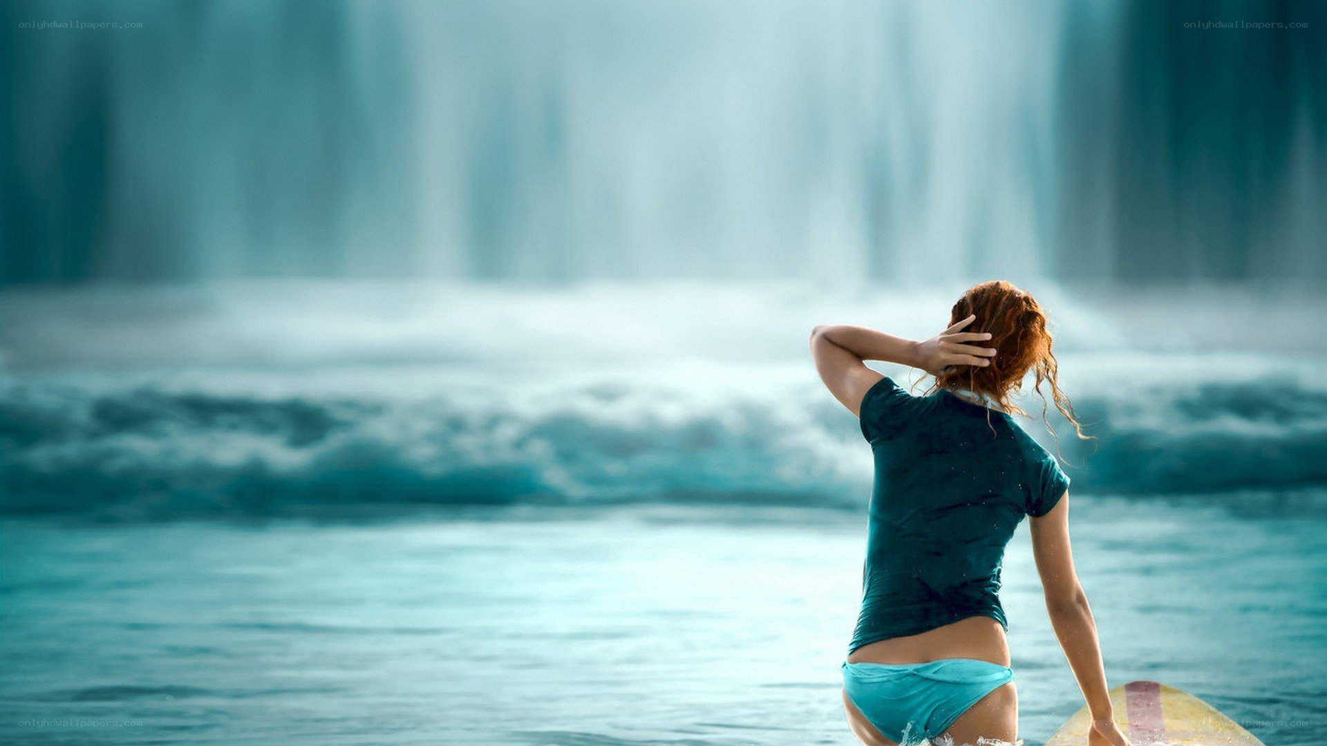 Surfer at the waterfall