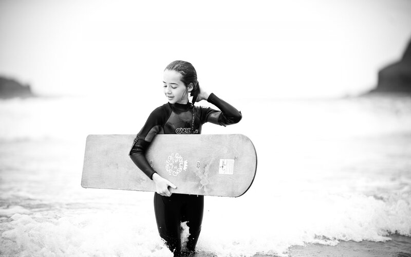 surfer girl at the beach