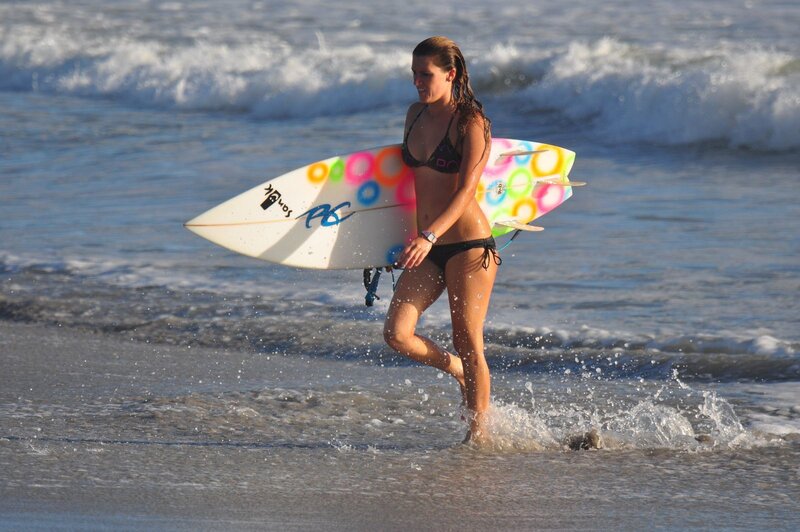 Surfer girl at the beach