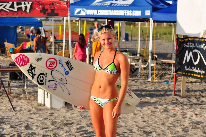 Surfer girl with surfboard