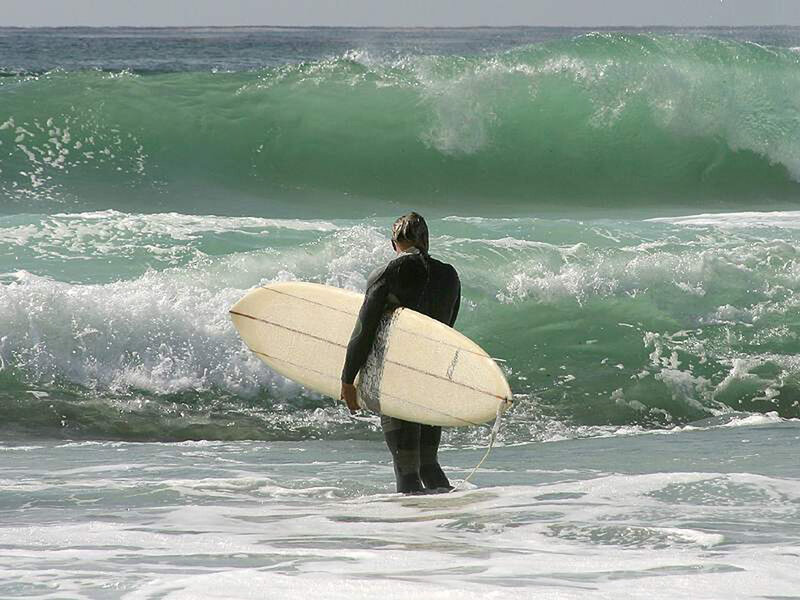 Surfer Holding Surfboard