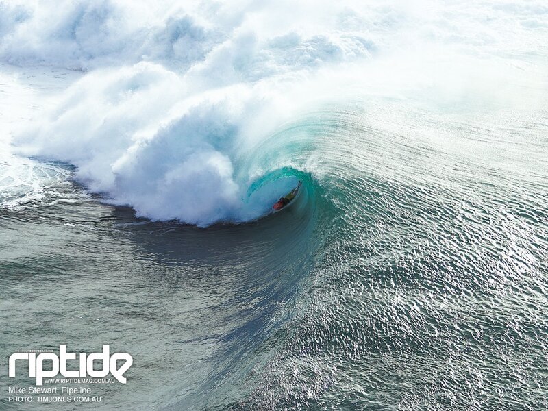Surfer in a large wave