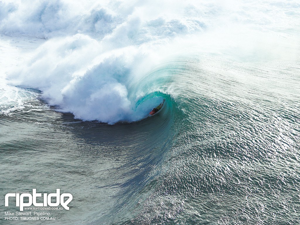 Surfer in a large wave