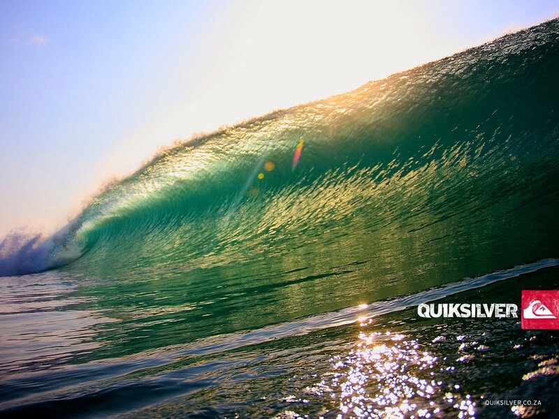 Surfer in a large wave