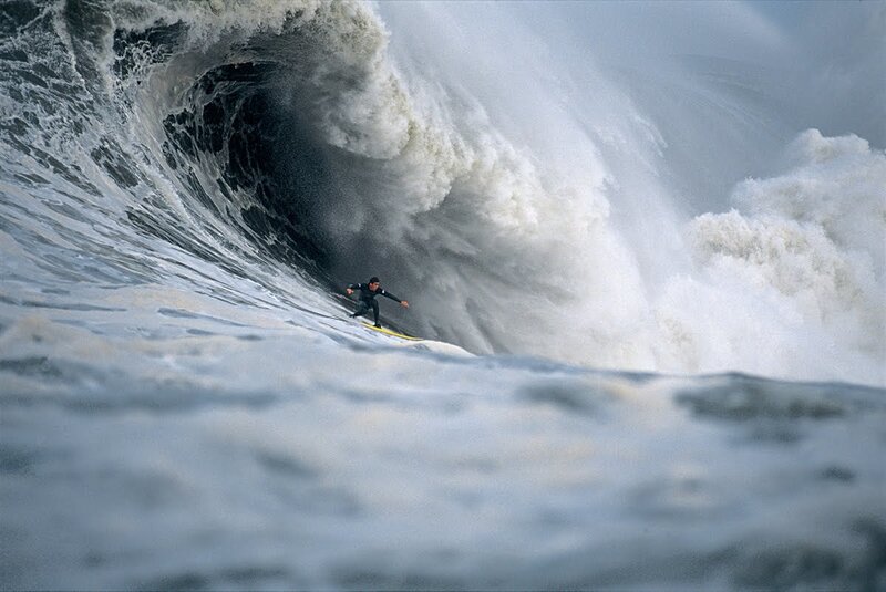 Surfer in a massive wave