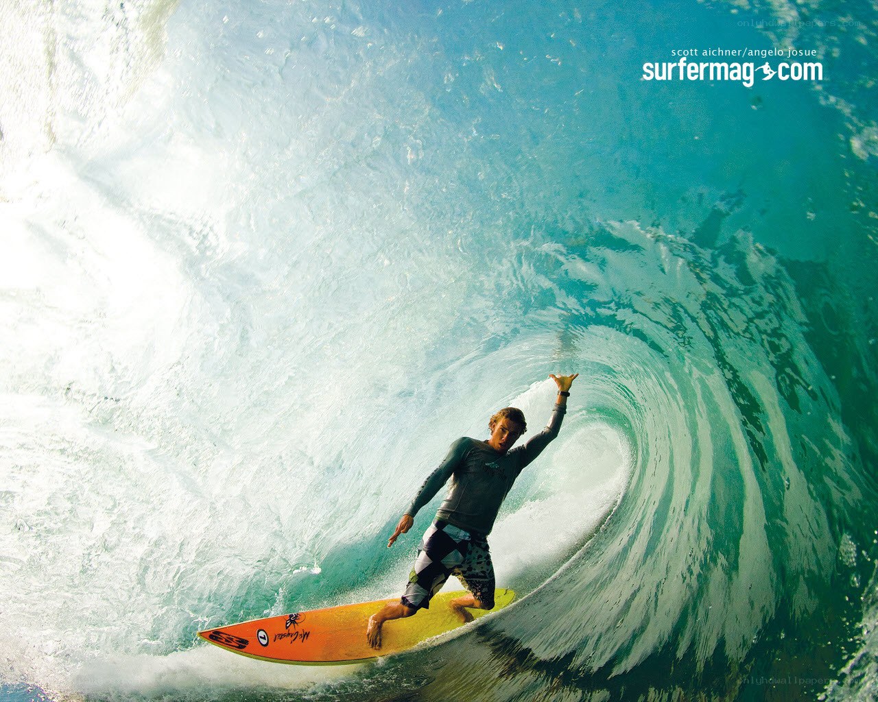 Surfer in a wave barrel