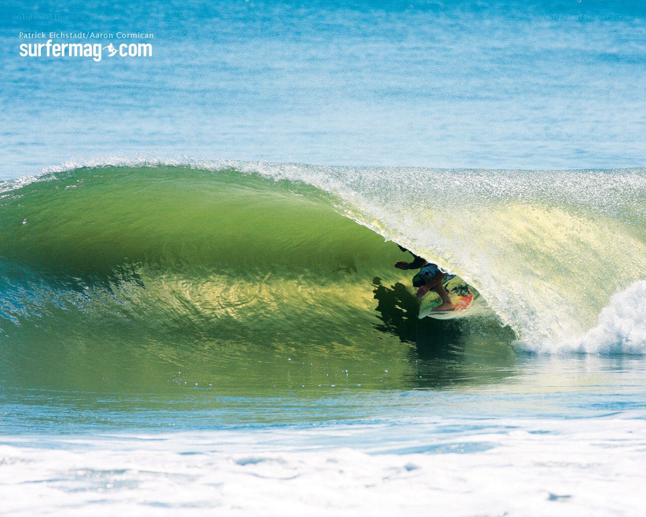 Surfer in a wave barrel