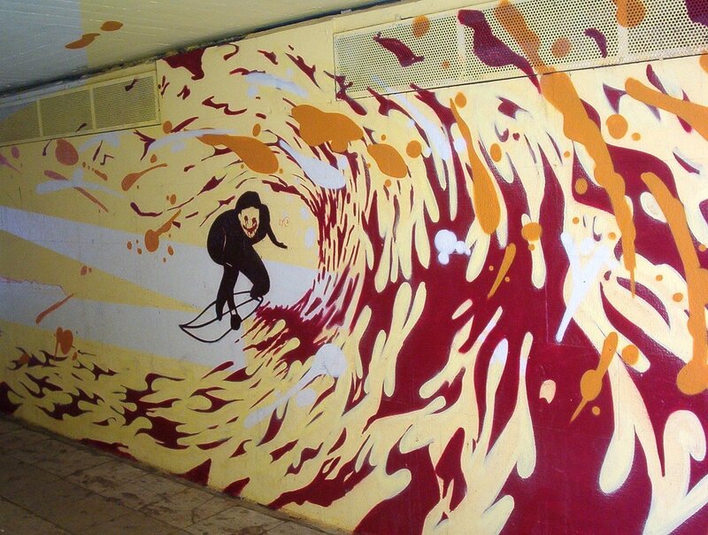 Surfer in a wave mural
