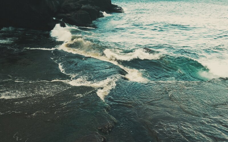 Surfer in Ocean Waves — Blue