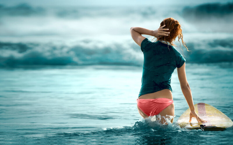 Surfer in ocean waves