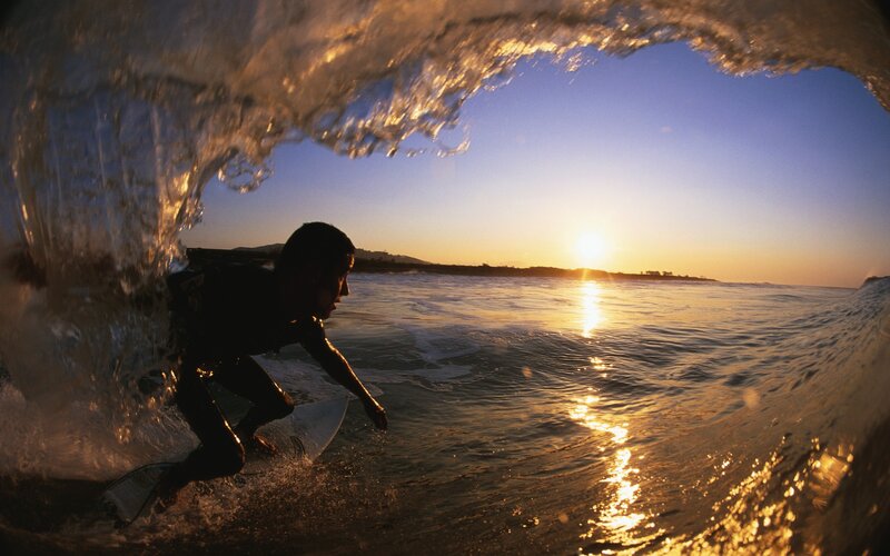 Surfer in Wave Tunnel — Blue, Dramatic, Sunset, Photograph, Sun