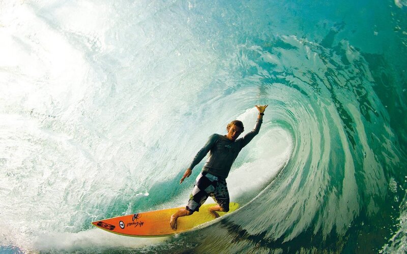 Surfer in Wave Tunnel — Blue, Dynamic, Afternoon, Photograph, Surfboard, Ocean, Green, Yellow