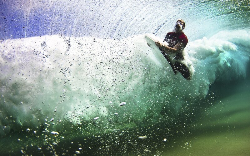 surfer inside a wave