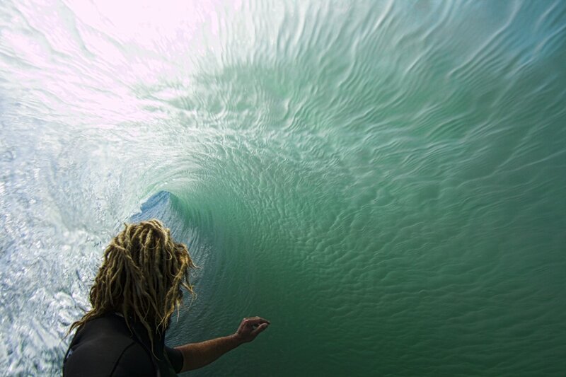surfer inside a wave tunnel