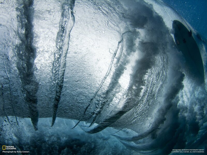 Surfer Inside Wave