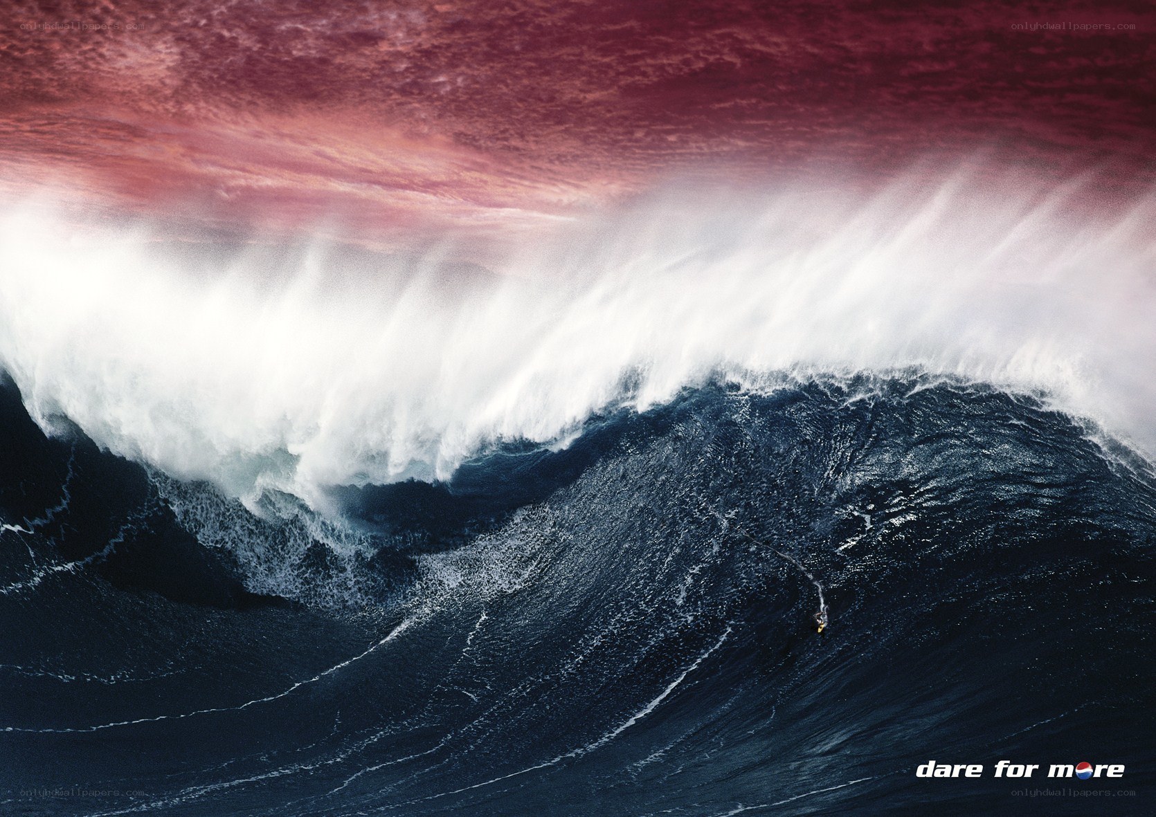 Surfer on a massive wave