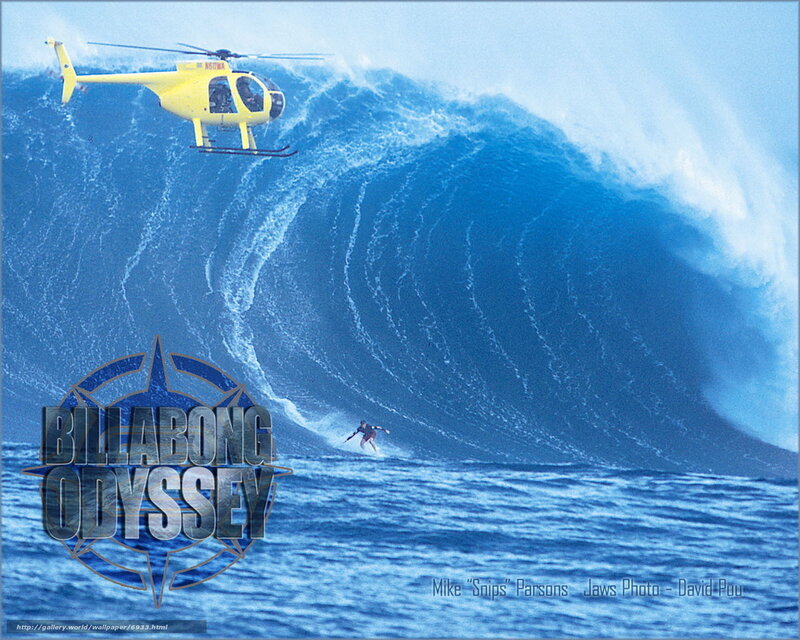 Surfer on a massive wave