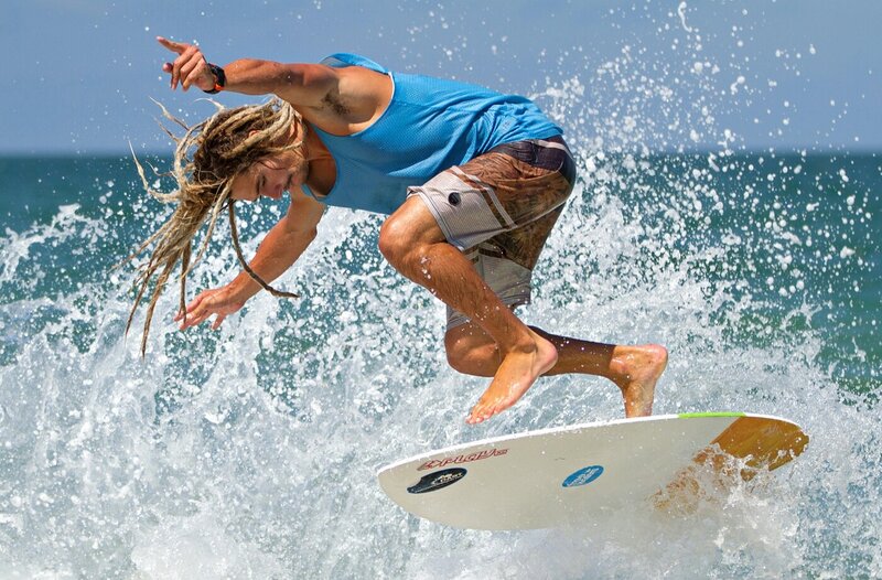 Surfer on a Wave — Blue, Dynamic, Afternoon, Photograph, Surfboard, Ocean, Splashing Water