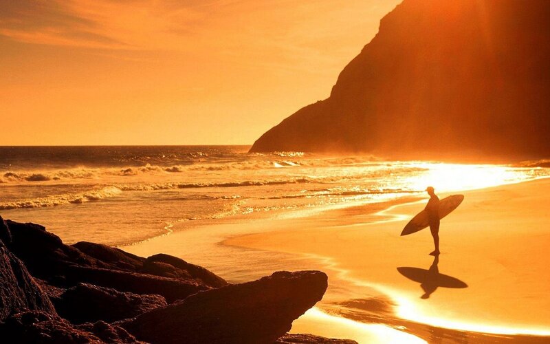 Surfer on Beach — Orange, Dramatic, Sunset, Photograph, Ocean, Cliff
