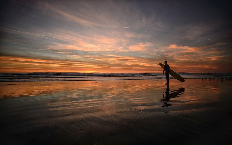 Surfer on Beach — Orange, Dramatic, Sunset, Photograph, Surfboard, Ocean