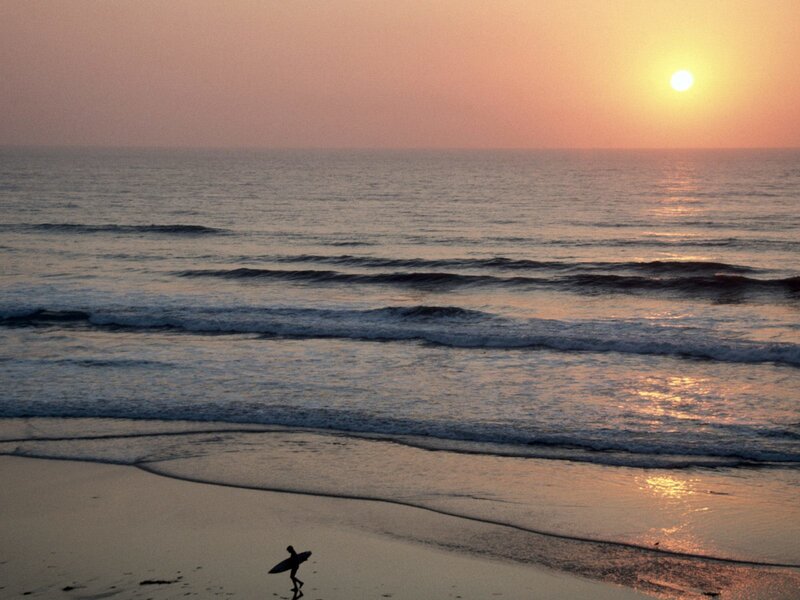 Surfer on Beach — Orange, Serene, Sunset, Photograph, Ocean, Sun, Sand, Blue