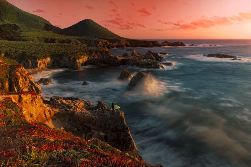 Surfer on Cliff Edge