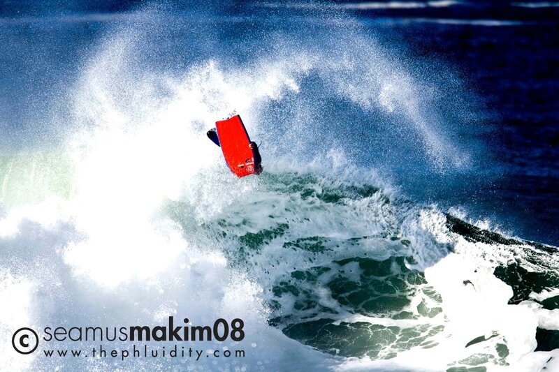 Surfer on red bodyboard