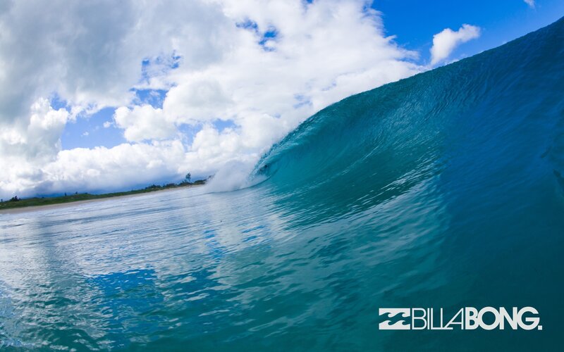Surfer riding a large wave